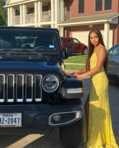 Young lady in a prom gown heading to prom